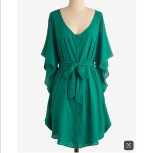 Green flows dress with matching tie belt